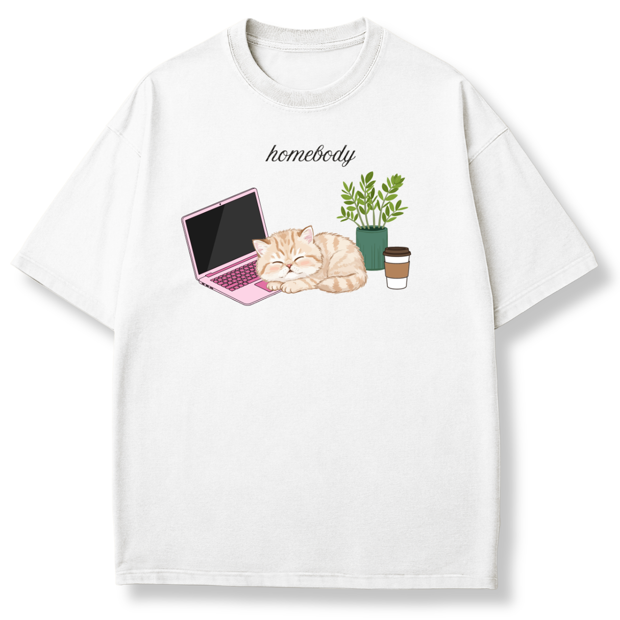 A white short-sleeve crewneck t-shirt featuring a cute graphic of a sleeping orange tabby cat next to a pink laptop, a green potted plant, and a coffee cup, with the word 'homebody' printed above.